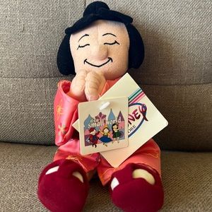 It’s a small world Japan girl bean bag character. NWT